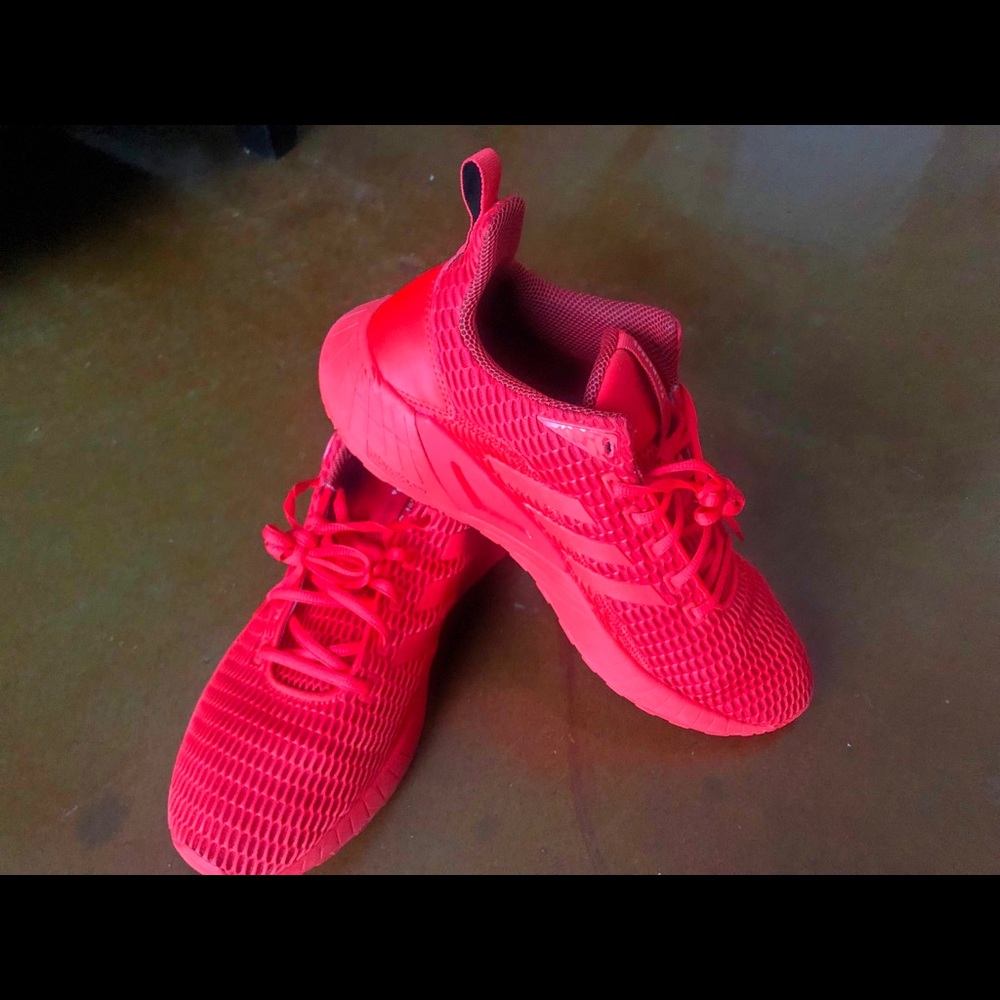 Red adidas low-tops size 11